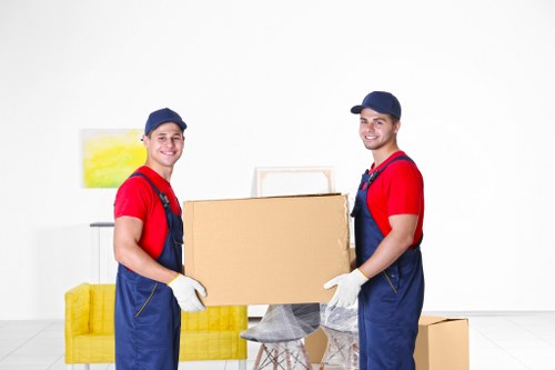 Local man and van moving furniture in Sutton residential area