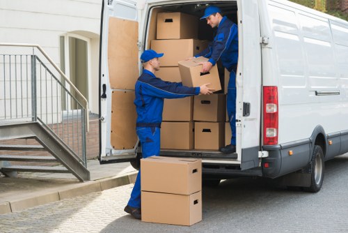 Loading furniture into a removal van for a home move in Sutton
