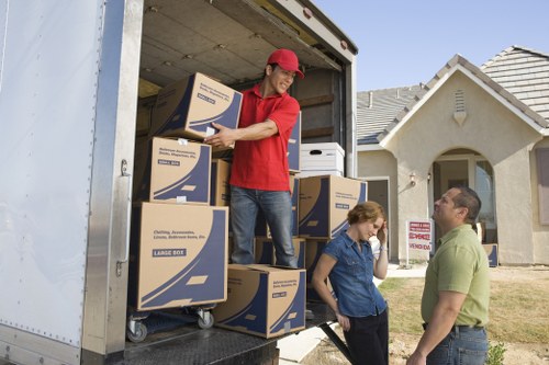Packed boxes and furniture prepared for storage in Sutton