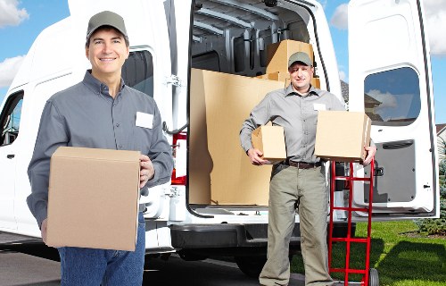 Local packing team preparing boxes for a Sutton relocation