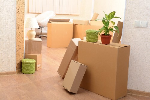 Boxes and furniture prepared for a student move in Sutton